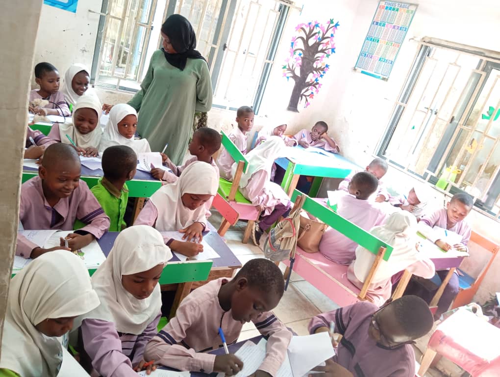 Students learning in a modern classroom at LearnSwift Academia